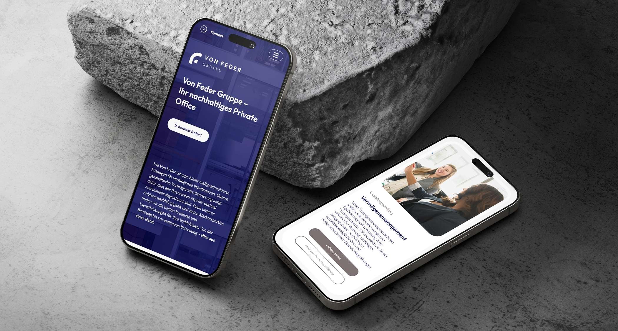 Zwei Handys auf Steinuntergrund zeigen das Webdesign der Firma von Feder Gruppe.